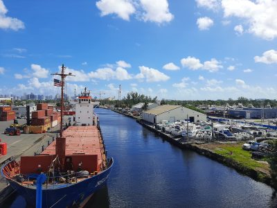 Antillean cargo vessel docked at the Miami River terminal supporting Caribbean shipping operations.